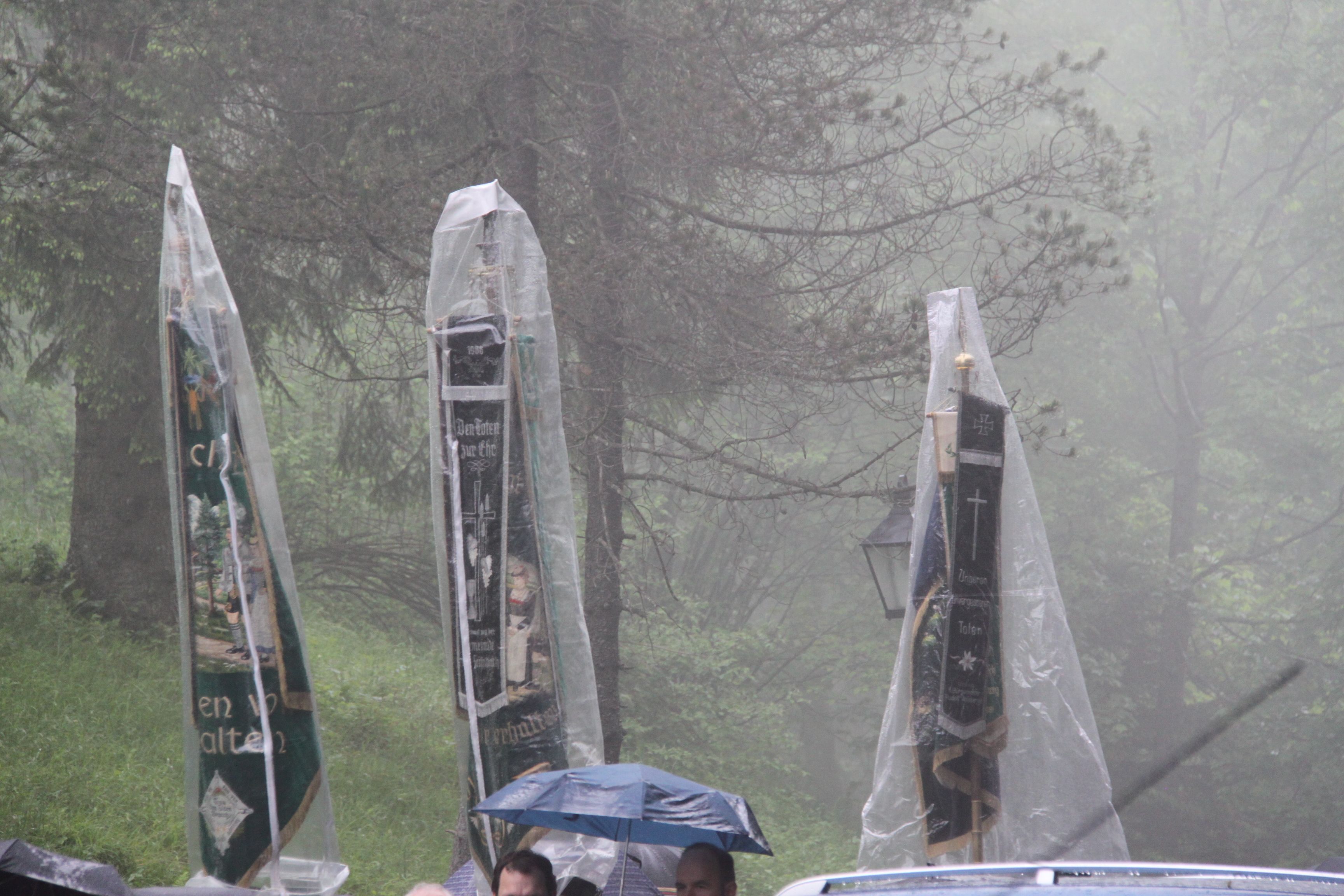 transparent covers and sacks protect flags against rain