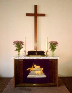 altar cloth with animals and angel