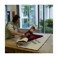 The readily sewn, restored flag still without hanging